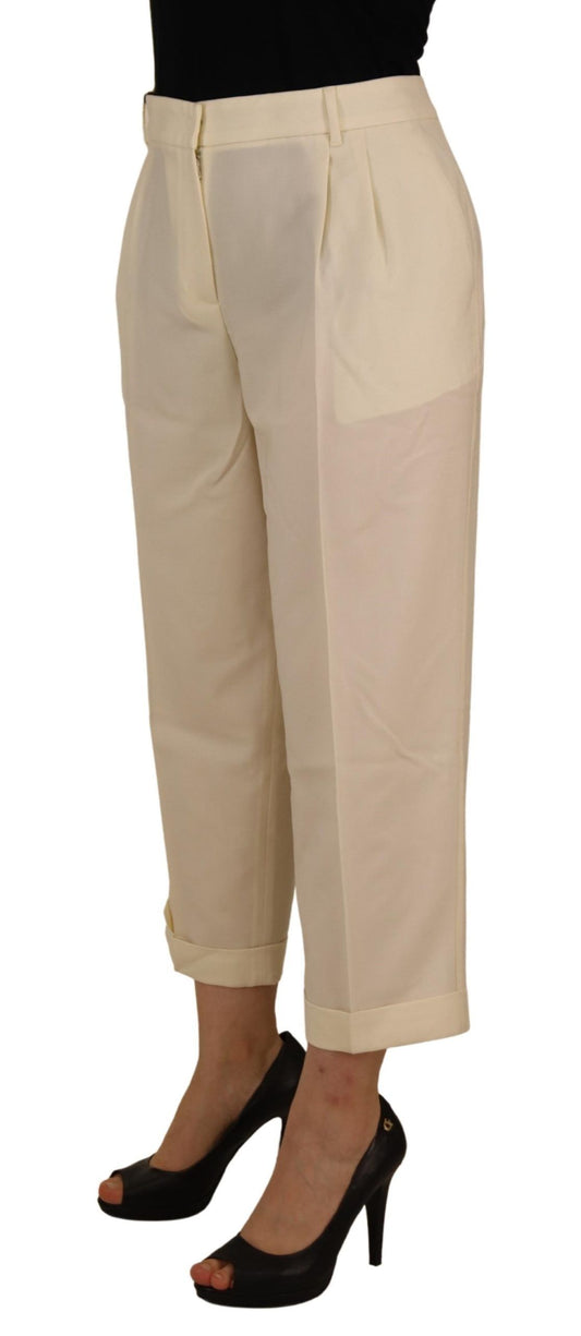 Tan pants with rolled up legs