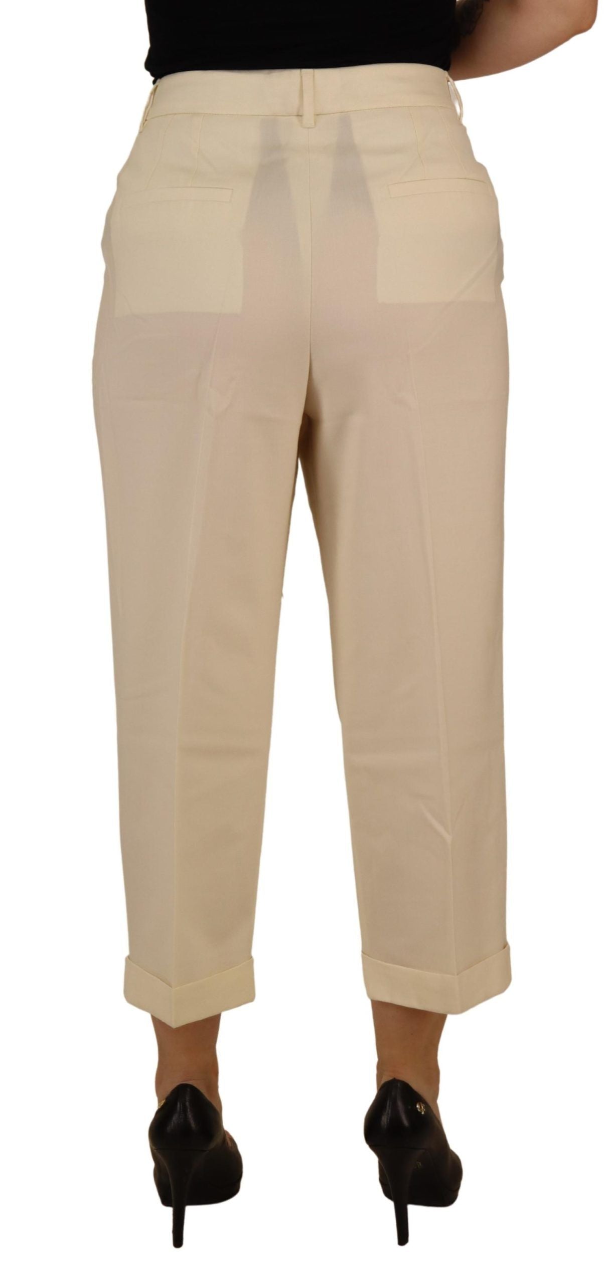 Tan pants with a visible crease down the front