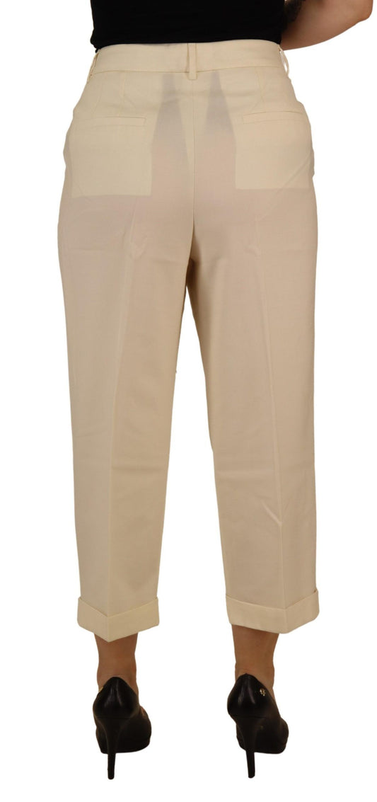 Tan pants with a visible crease down the front