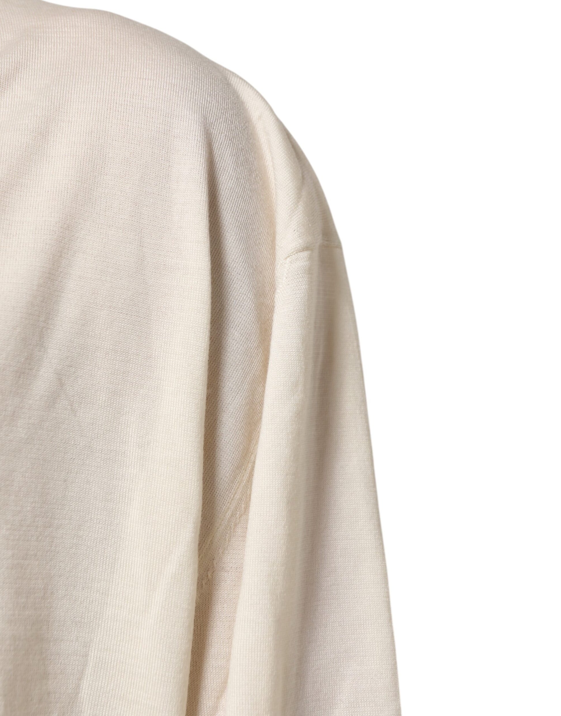 Tan fabric draped over shoulder