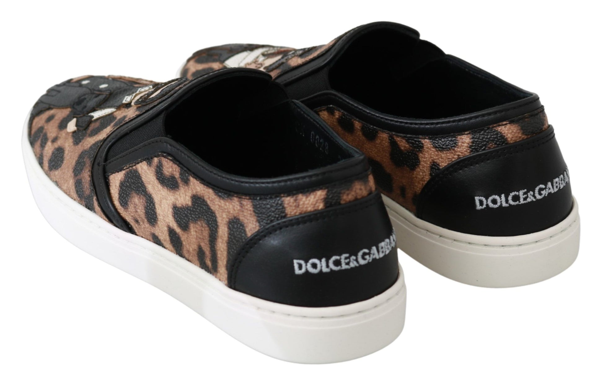 Pair of sneakers with animal print design and black laces