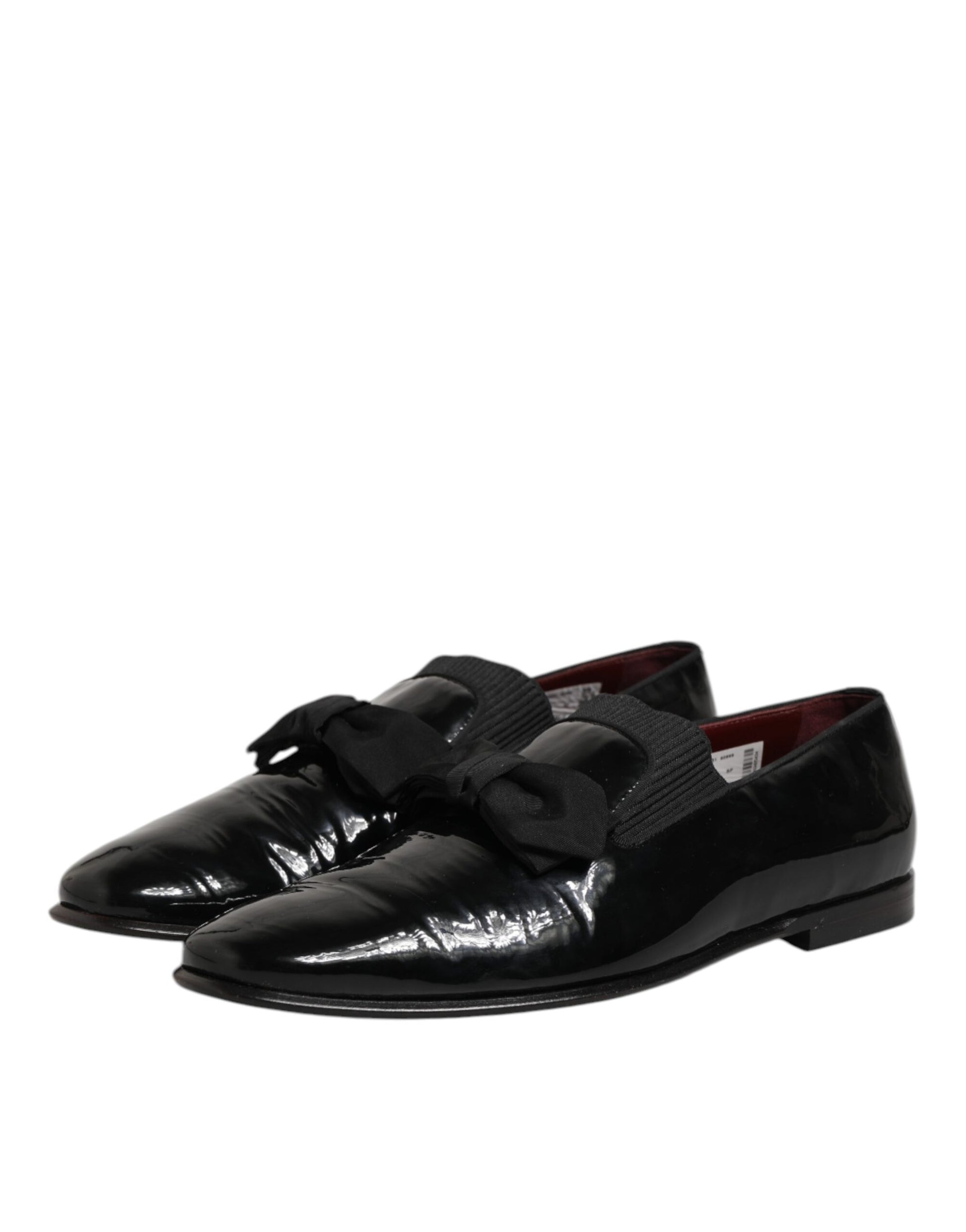 Black leather loafers with silver buckle detailing, men's formal dress shoes