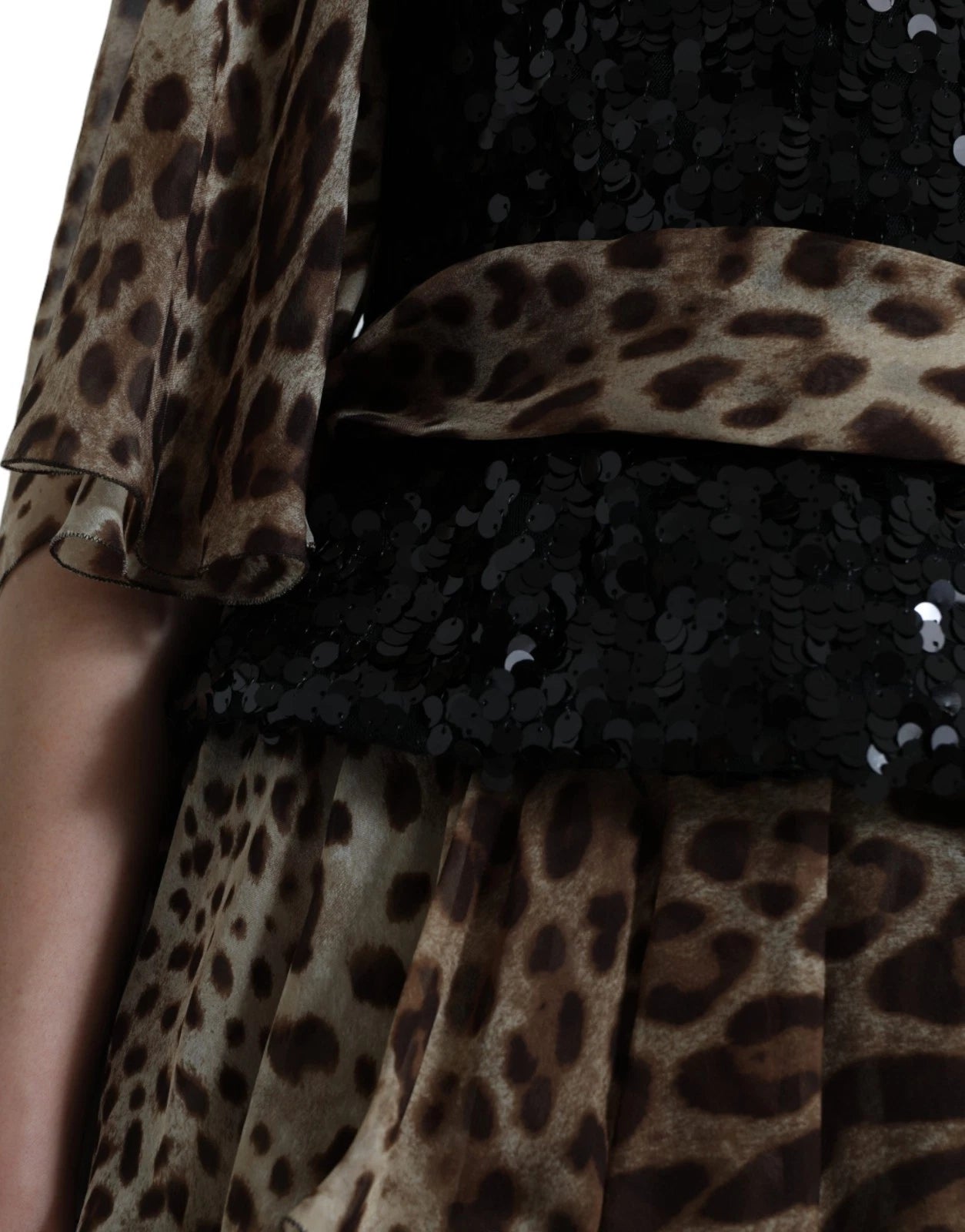 A leopard print dress with sequin ruffles and a belt, from the brand Dolce & Gabbana