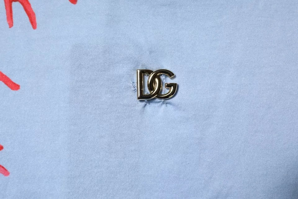 Small metal pin with a letter 'D' in the center