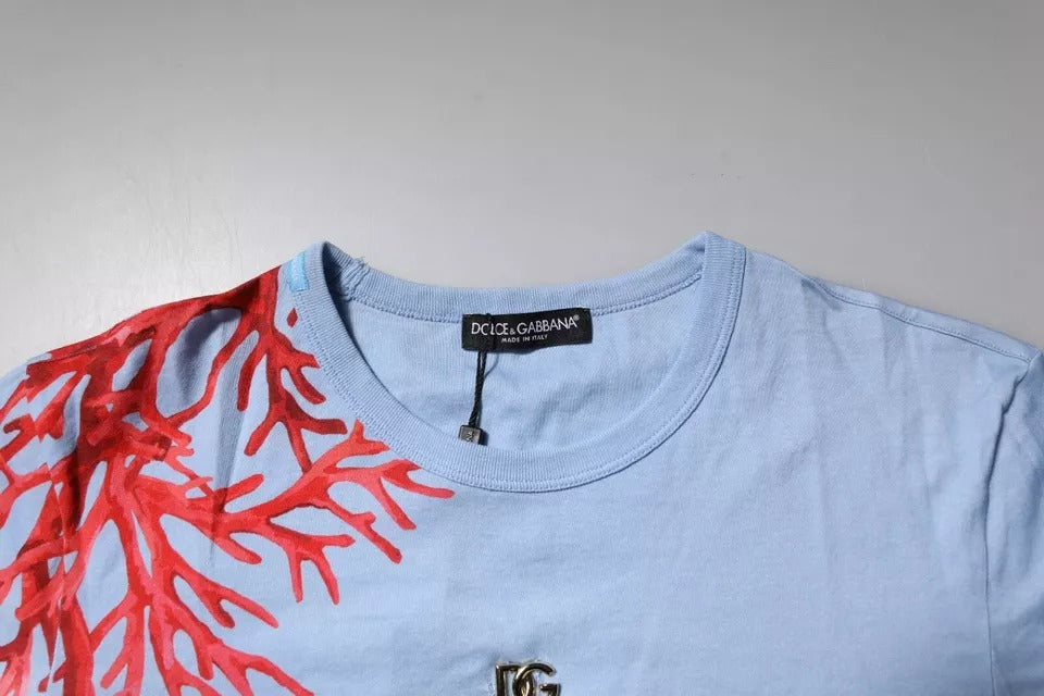 Blue t-shirt with red coral design on front