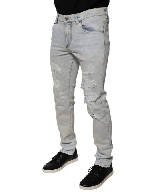 Man wearing blue jeans and black shoes