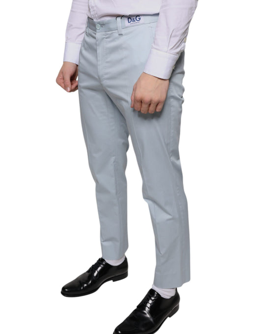 Men's light blue cotton dress pants with a slim fit, featuring a waistband and belt loops