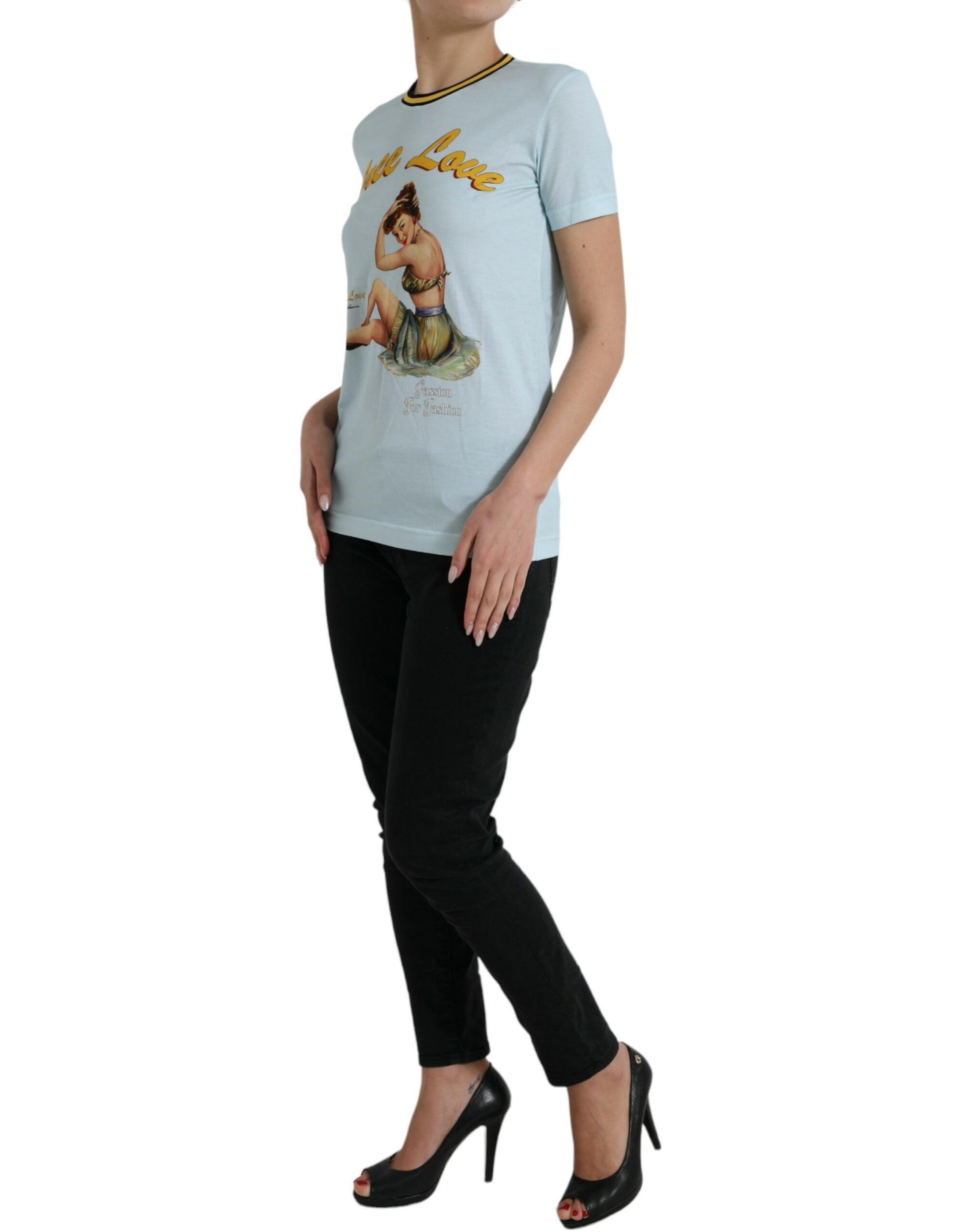 Woman wearing graphic t-shirt and black pants