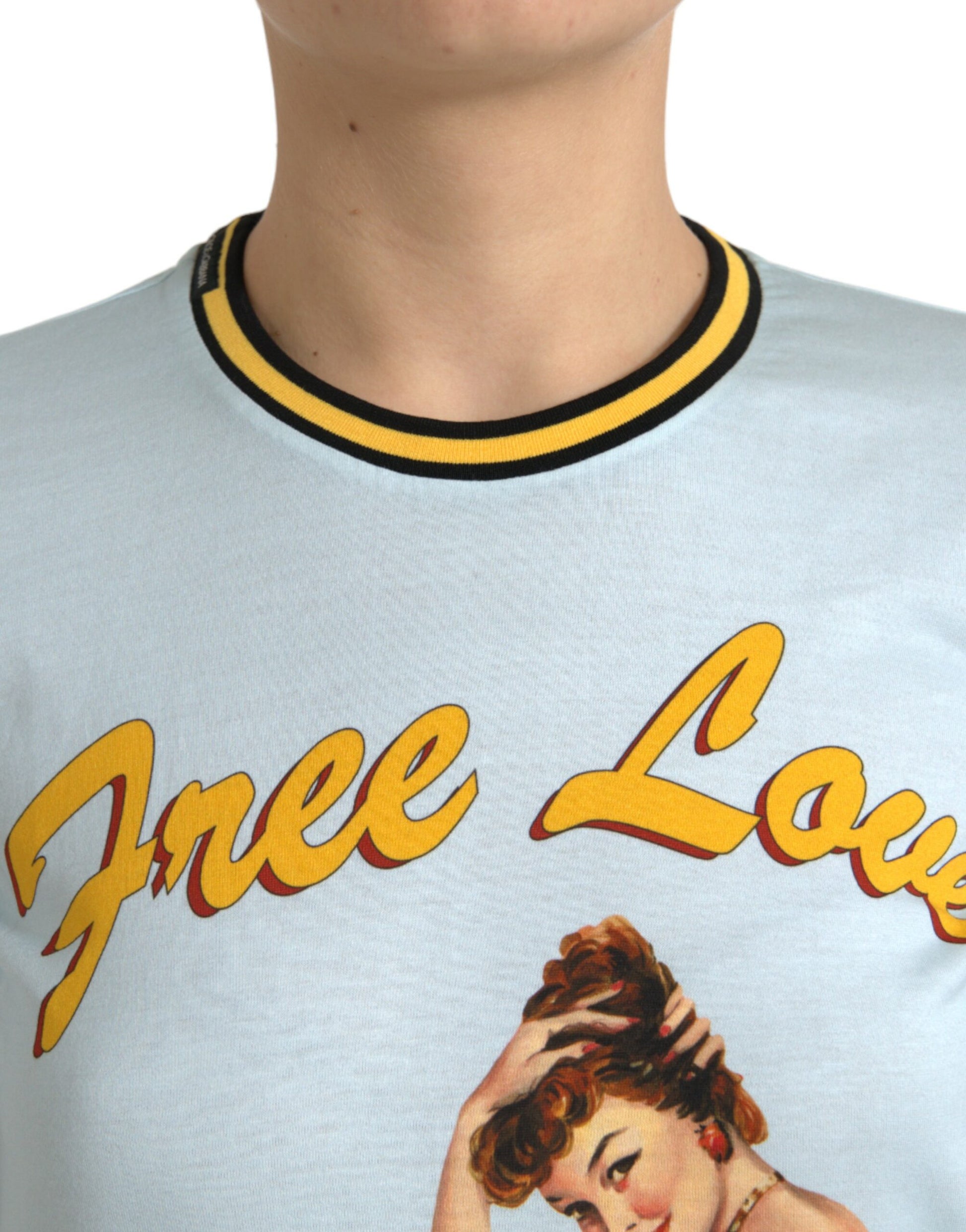 The shirt features a graphic design with a woman's face and the words "Free Love" written above her