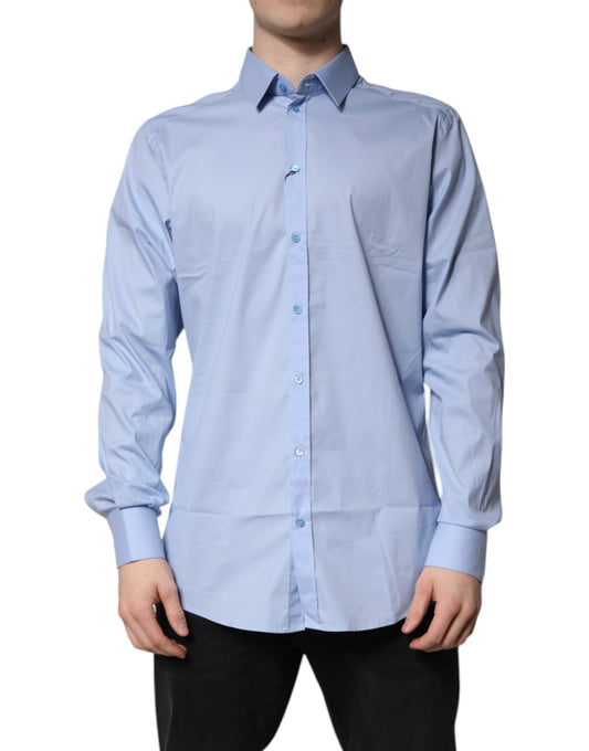 Men's light blue cotton dress shirt with gold buttons and cufflinks
