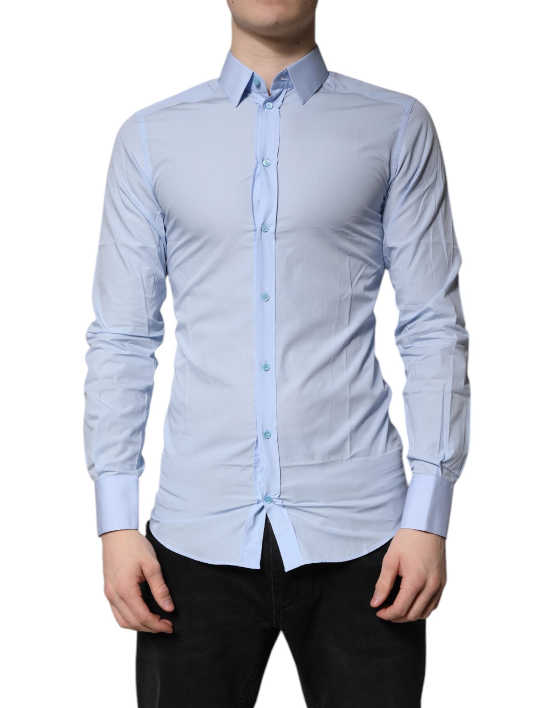 Men's light blue cotton dress shirt with gold buttons and collar, part of a formal wear collection