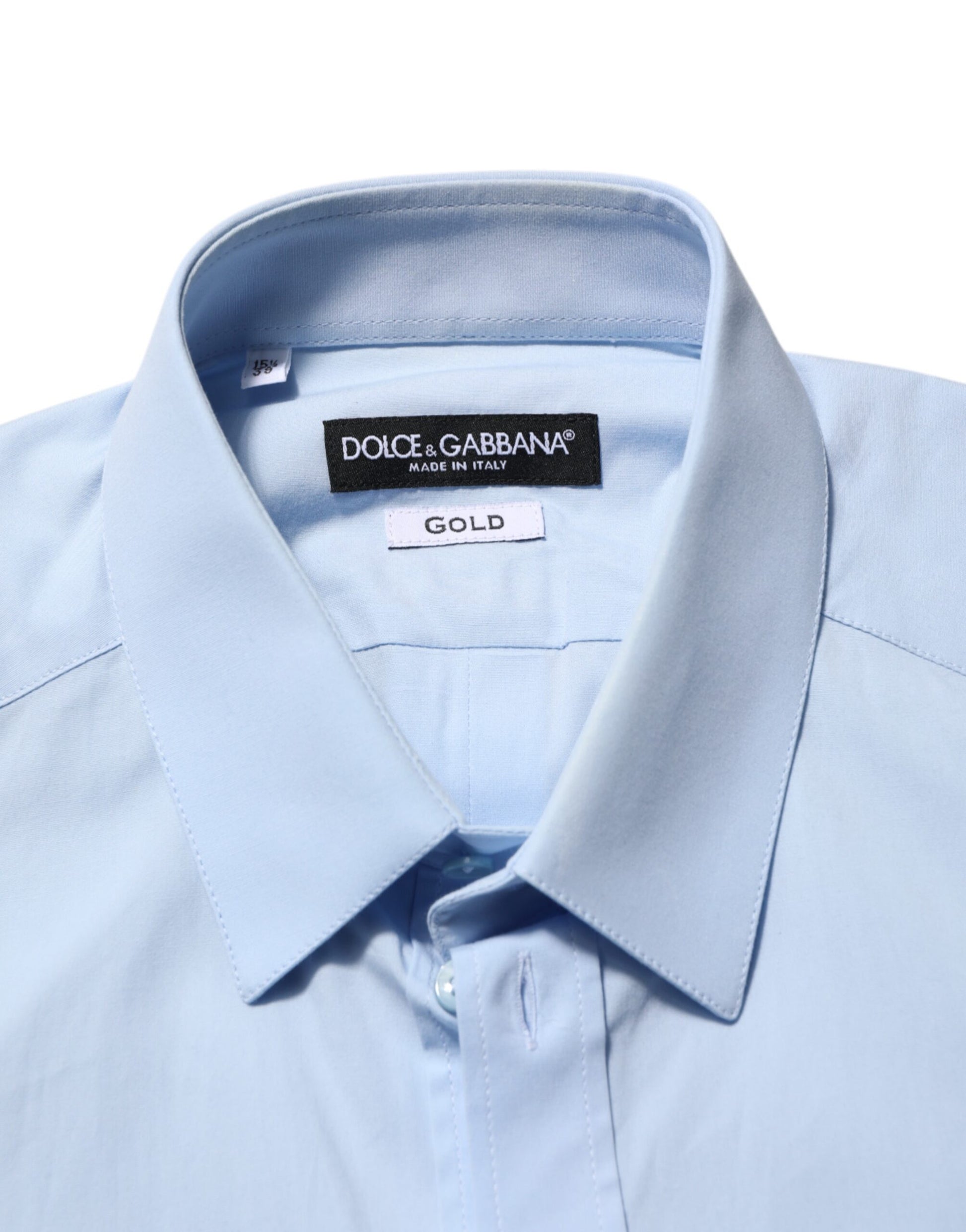 A light blue cotton dress shirt with a gold label from Dolce & Gabbana