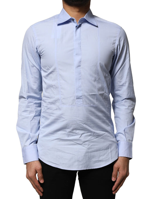 A long sleeve dress shirt in light blue cotton with a collar and button-down front