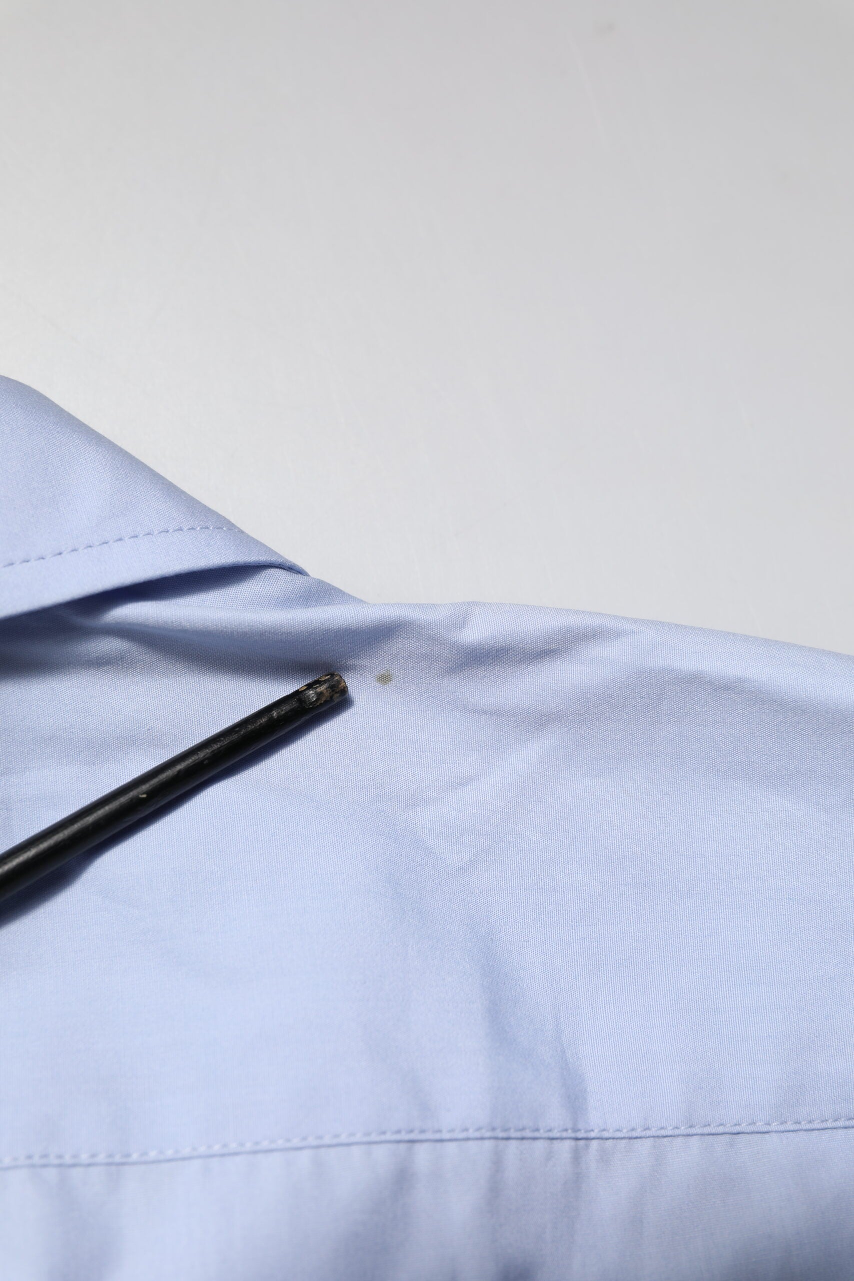 A light blue cotton dress shirt with long sleeves from the brand Dolce & Gabbana