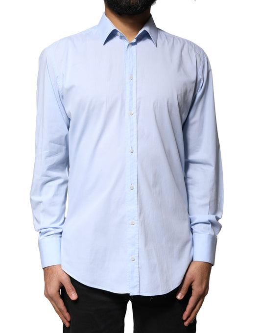 A light blue cotton dress shirt with long sleeves and a collar