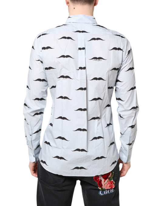 A light blue cotton shirt with a pattern of black mustaches and white collars