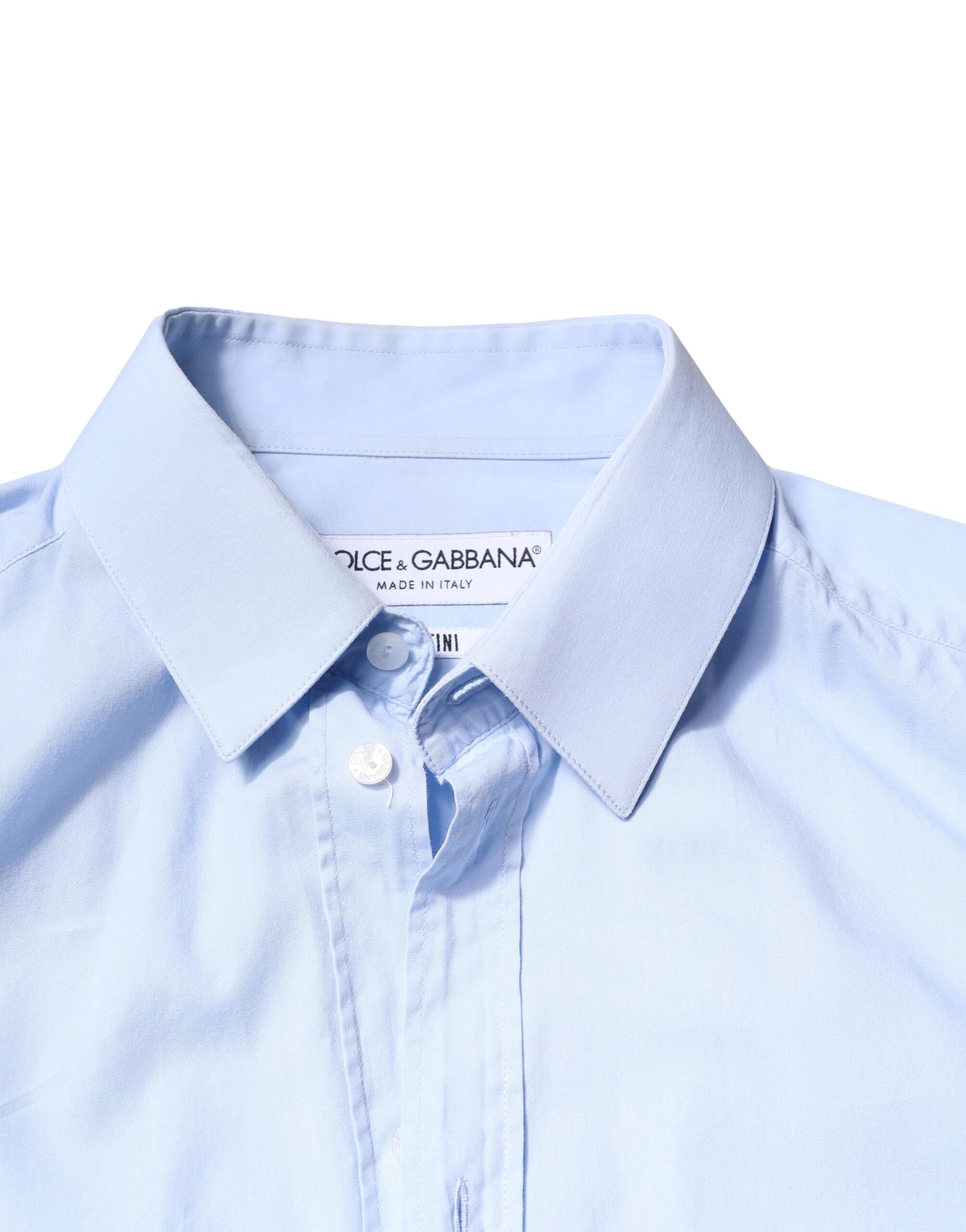 A light blue cotton dress shirt with a collar and buttons, from the brand Dolce & Gabbana