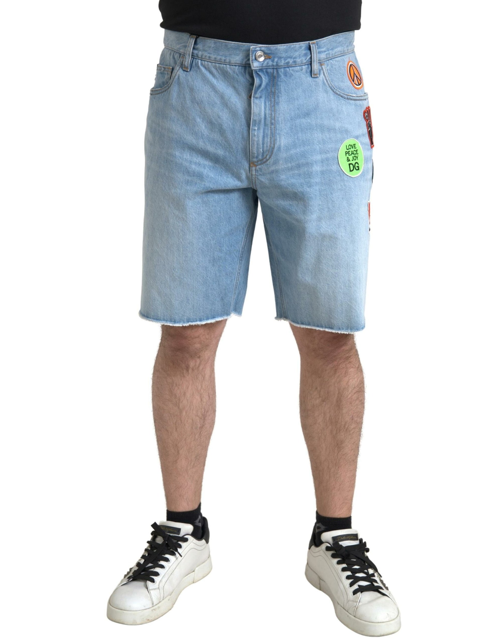 Man wearing denim shorts and sneakers