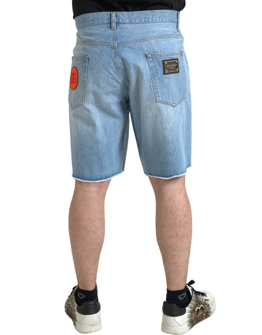 Pair of blue denim shorts with red logo on back pocket