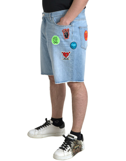 Man wearing denim shorts with stickers on them