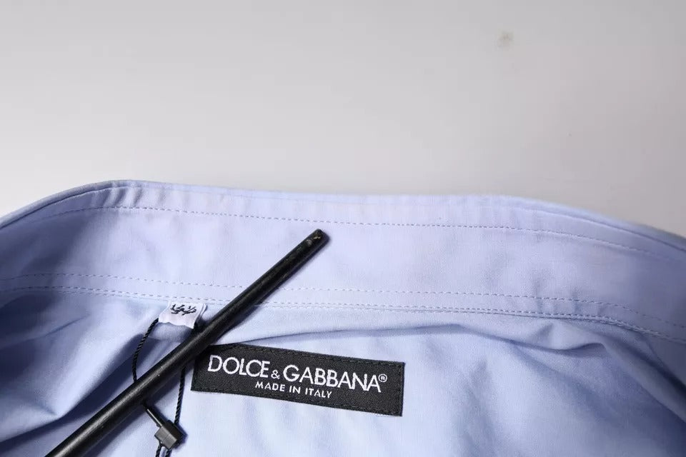 A light blue cotton men's dress shirt with a black label that reads "Dolce & Gabbana"