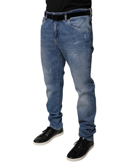Man wearing blue jeans and black shoes