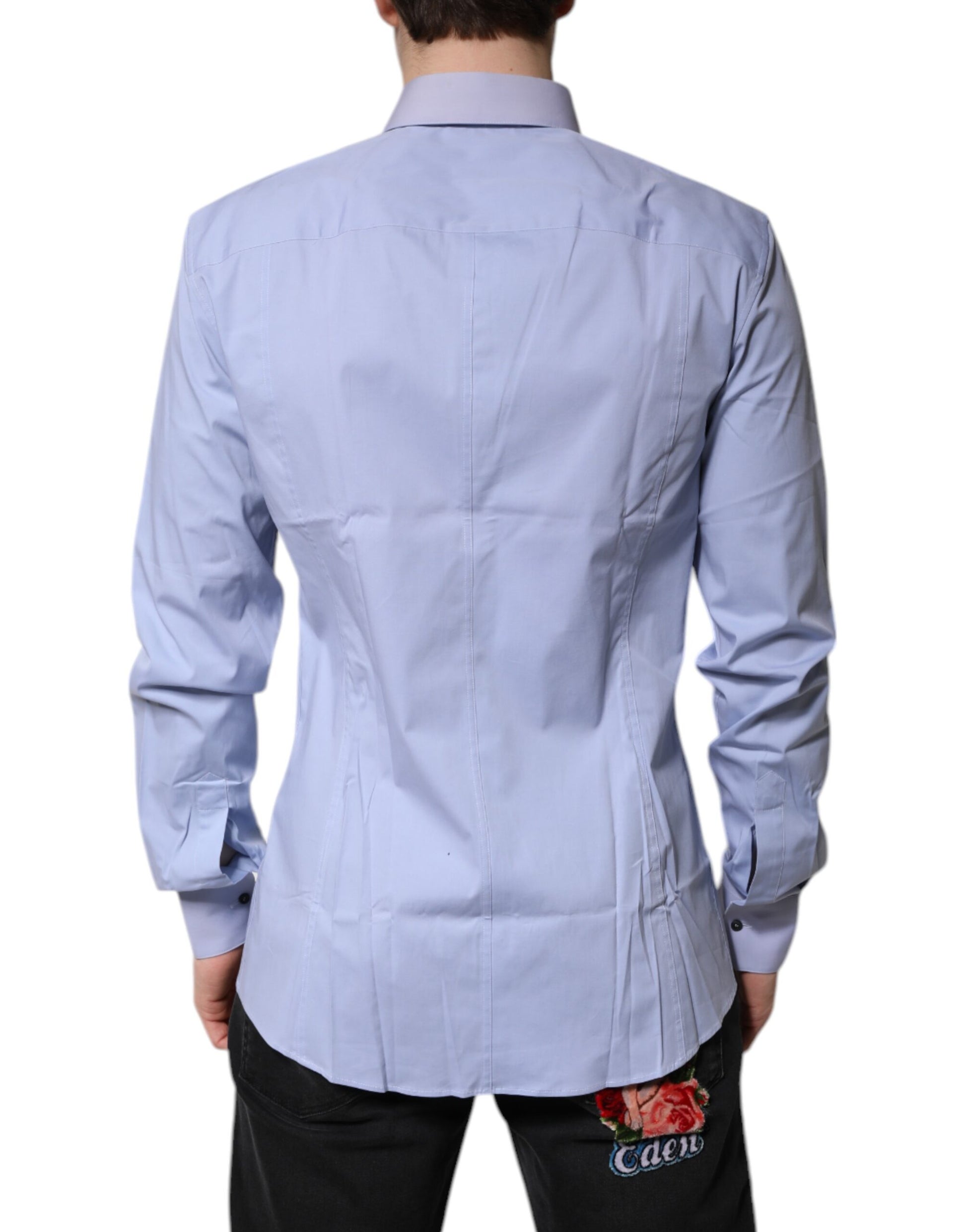 A light blue cotton dress shirt with a collar and long sleeves