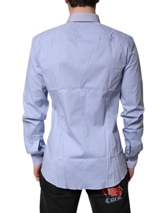 A light blue cotton dress shirt with a collar and long sleeves