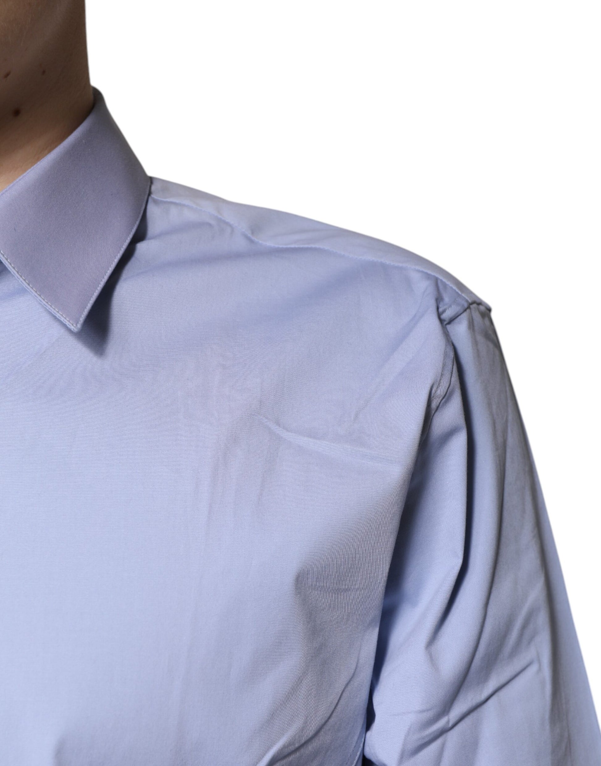 A light blue cotton dress shirt with a collar and long sleeves