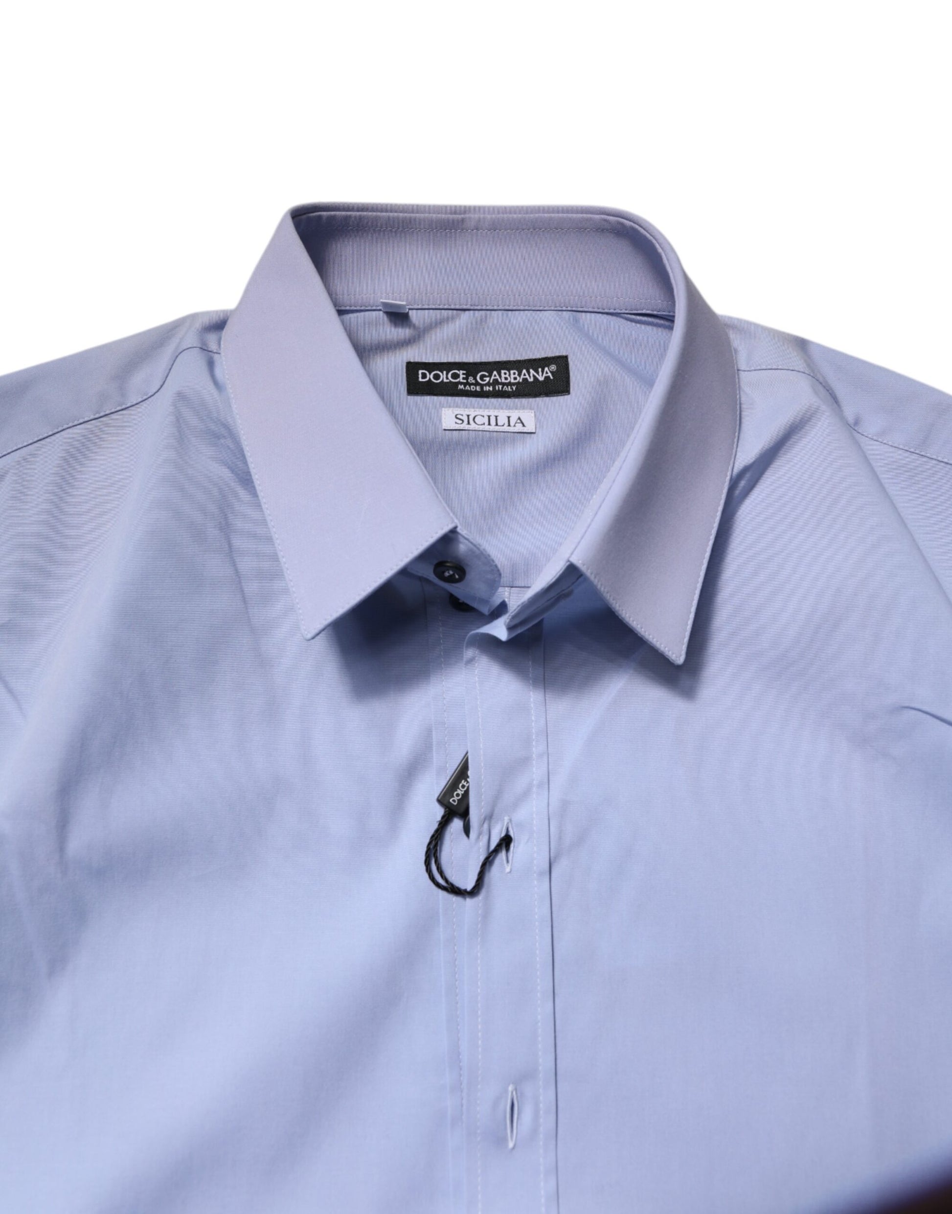 A light blue cotton dress shirt from Dolce & Gabbana, featuring a Sicilia design