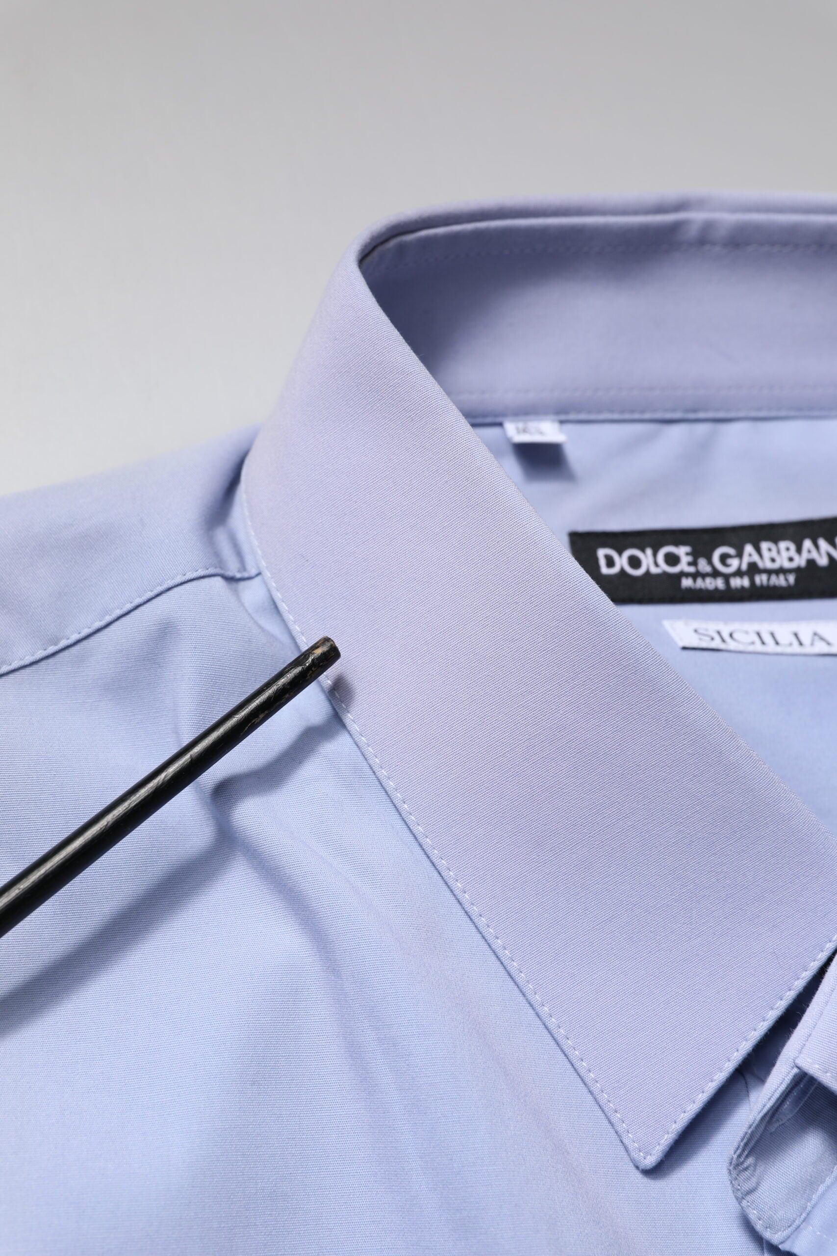 A light blue cotton dress shirt from Dolce & Gabbana, with a Sicilia label
