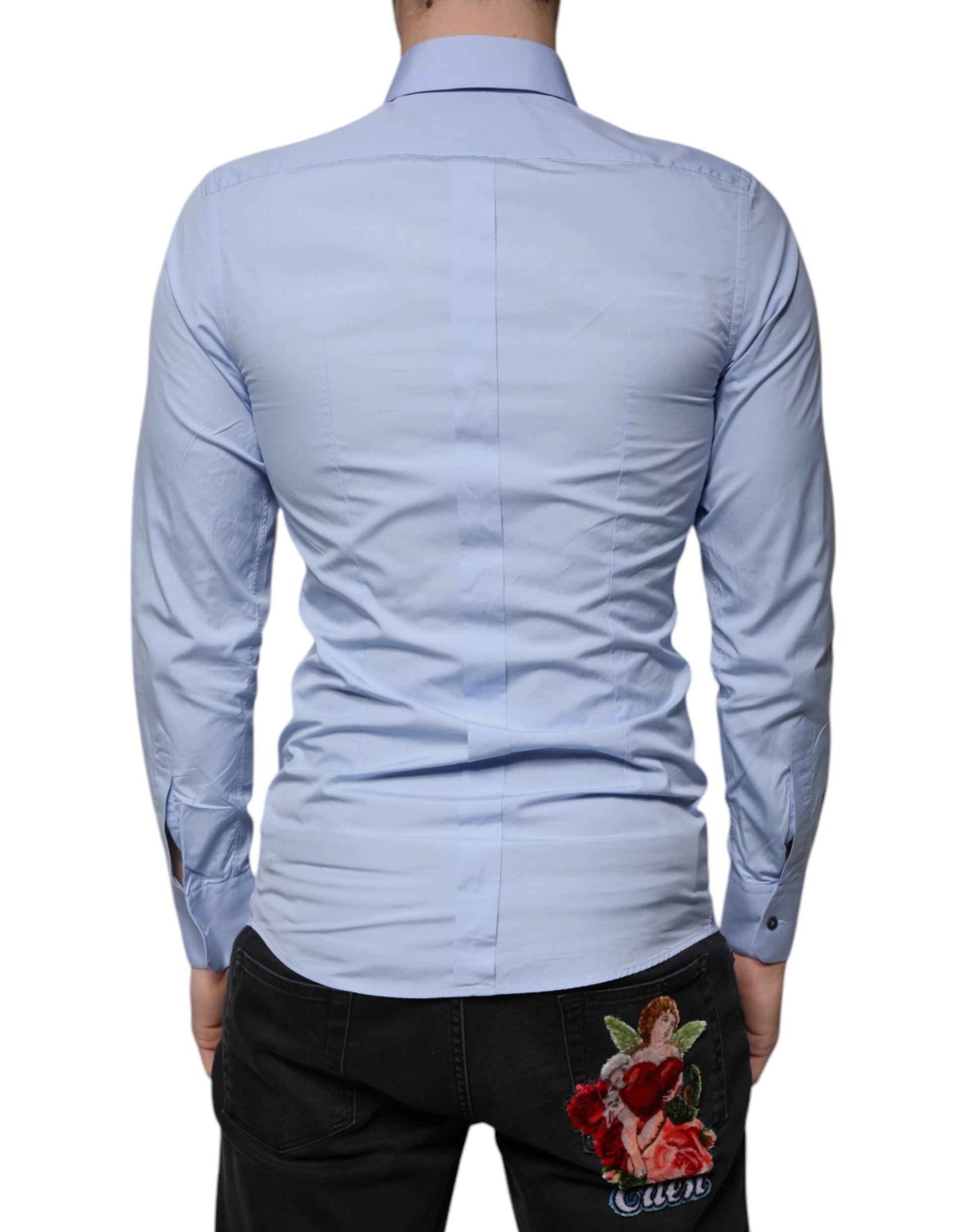A light blue cotton dress shirt with a slim fit, featuring a gold design