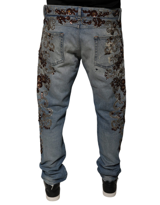 Pair of blue jeans with floral embroidery on legs