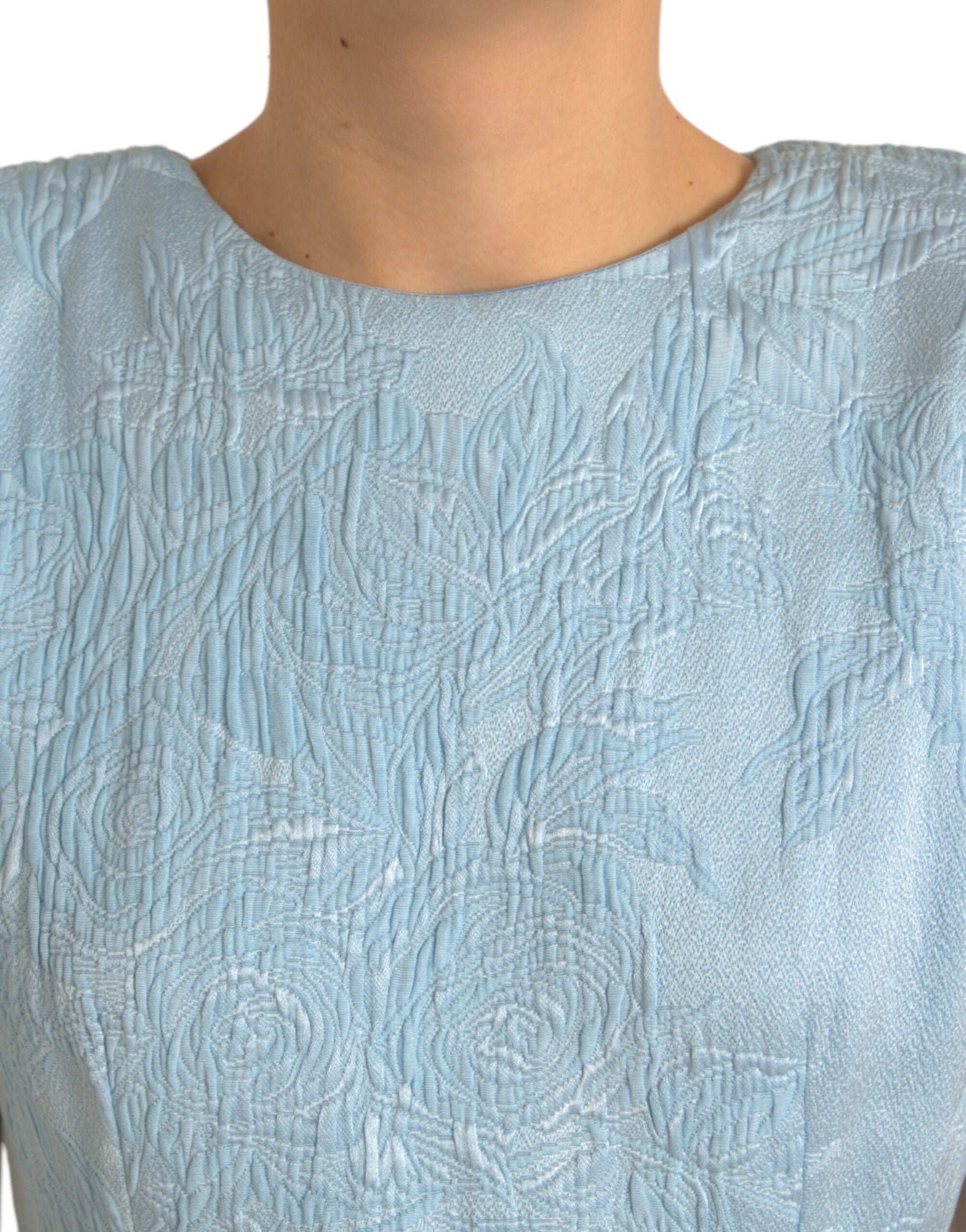 A light blue floral jacquard dress with puff sleeves