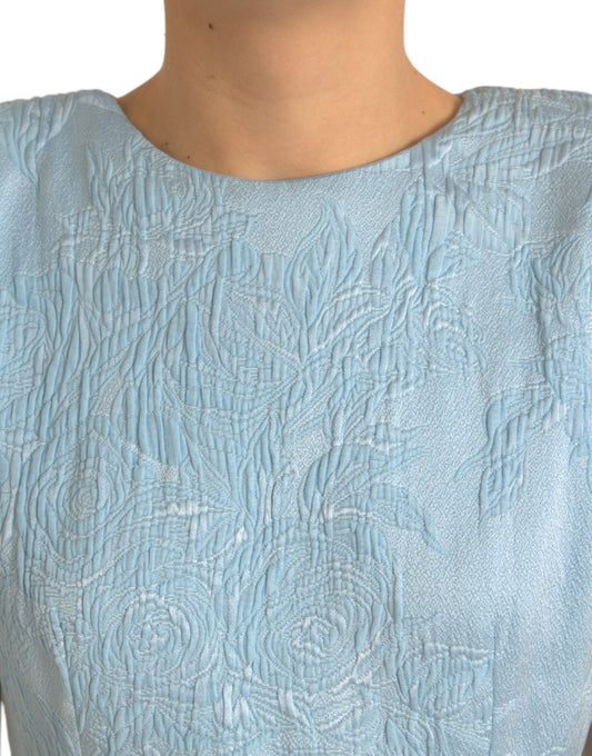 A light blue floral jacquard dress with puff sleeves