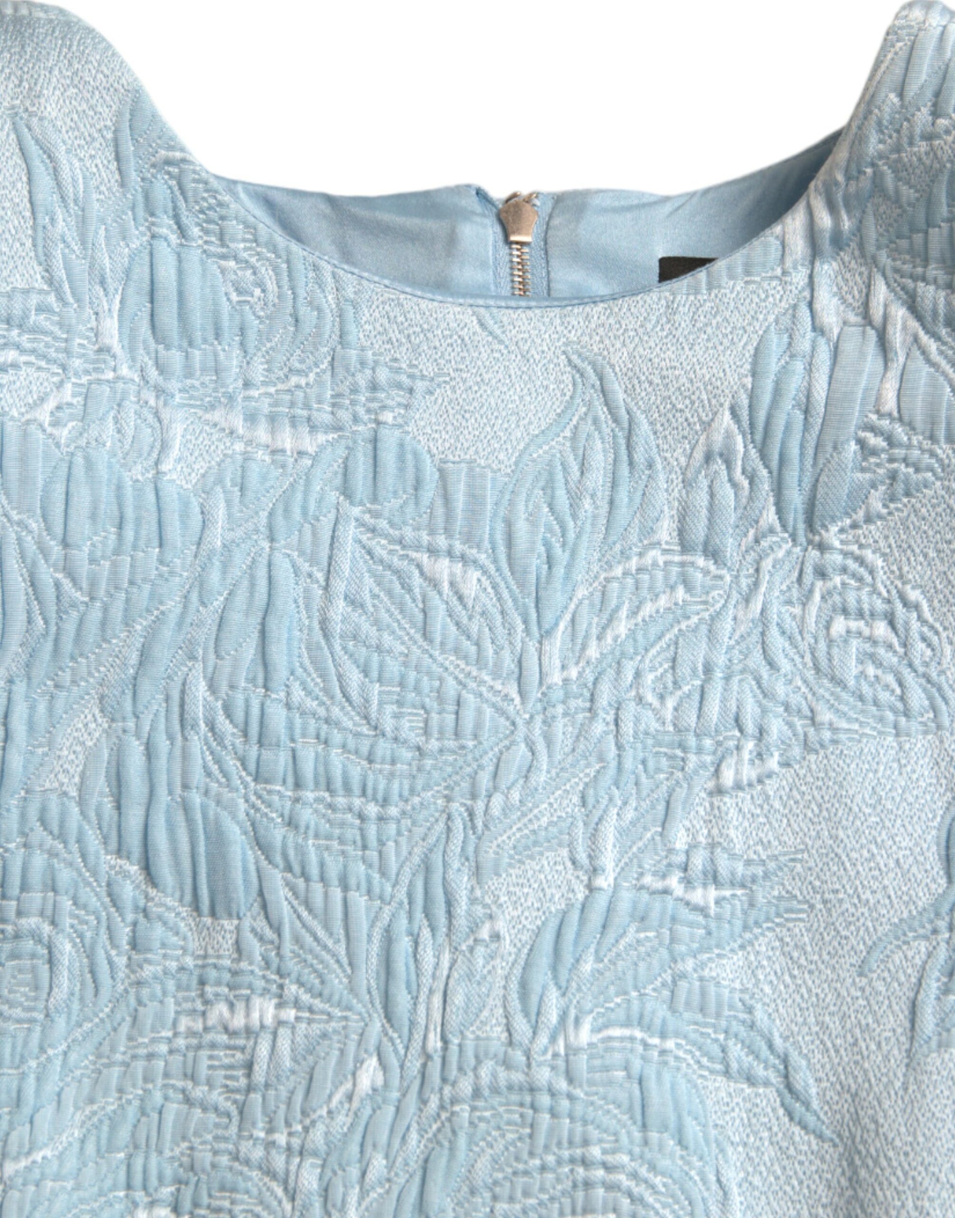 A light blue floral jacquard dress with puff sleeves