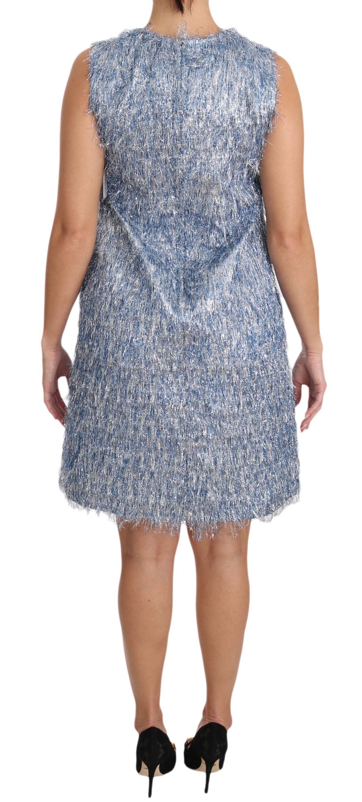 A sleeveless, light blue dress with sequin embellishments and fringe details