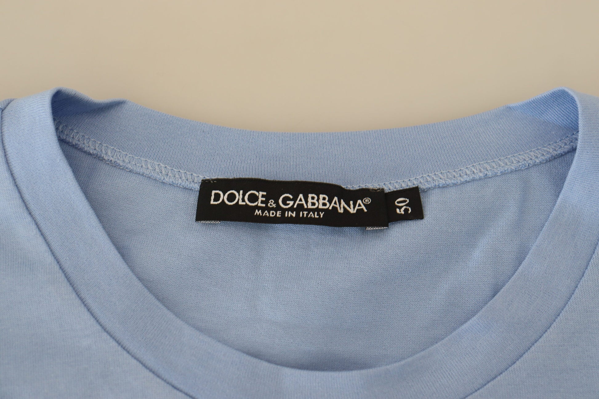 Blue t-shirt with white label