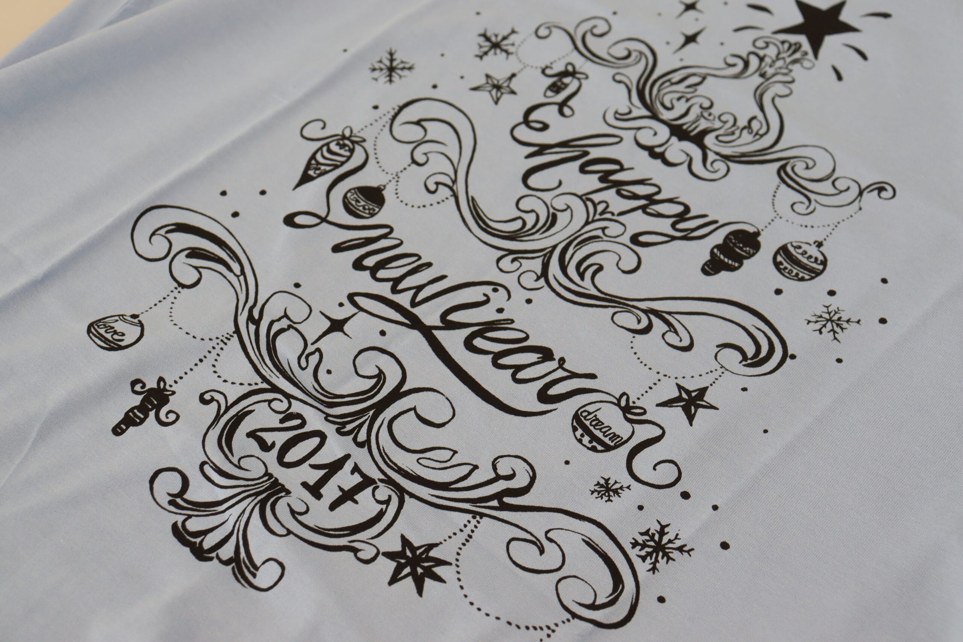 Black design on white fabric