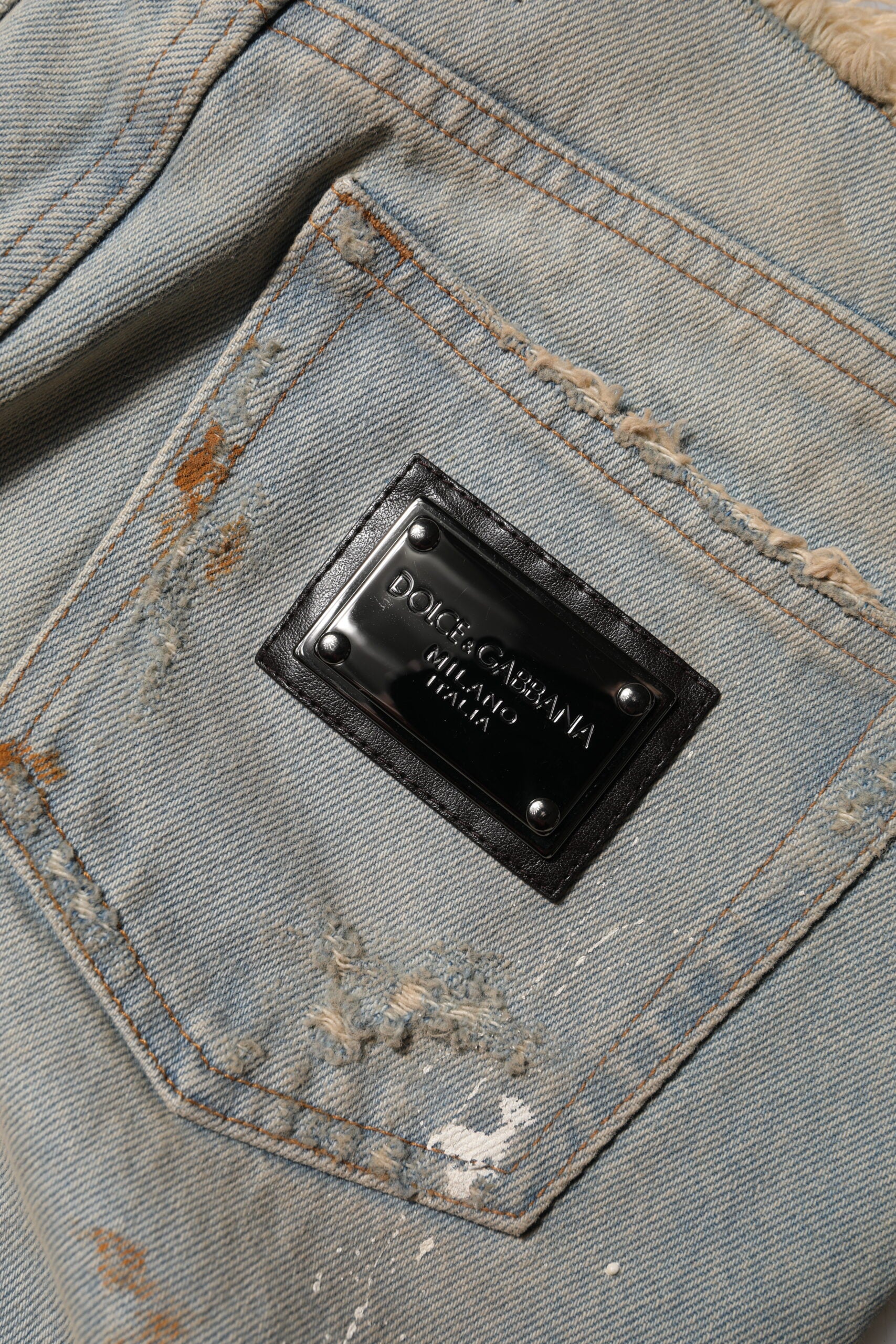 Blue denim jeans with a black condom in the pocket