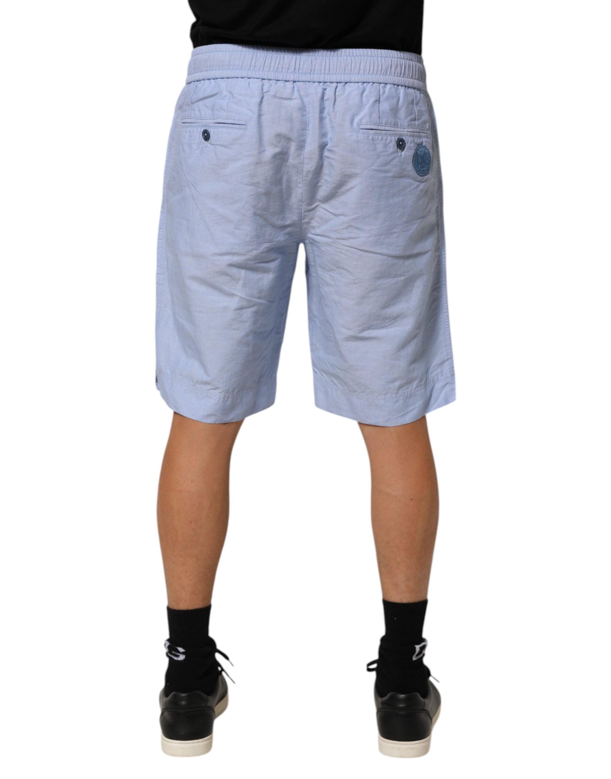 Pair of light blue shorts with pockets on sides