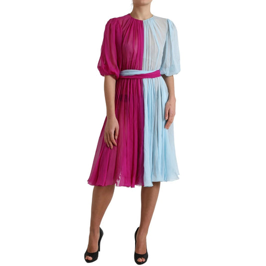 A light blue silk midi dress with a pink overlay and belt, designed by Dolce & Gabbana