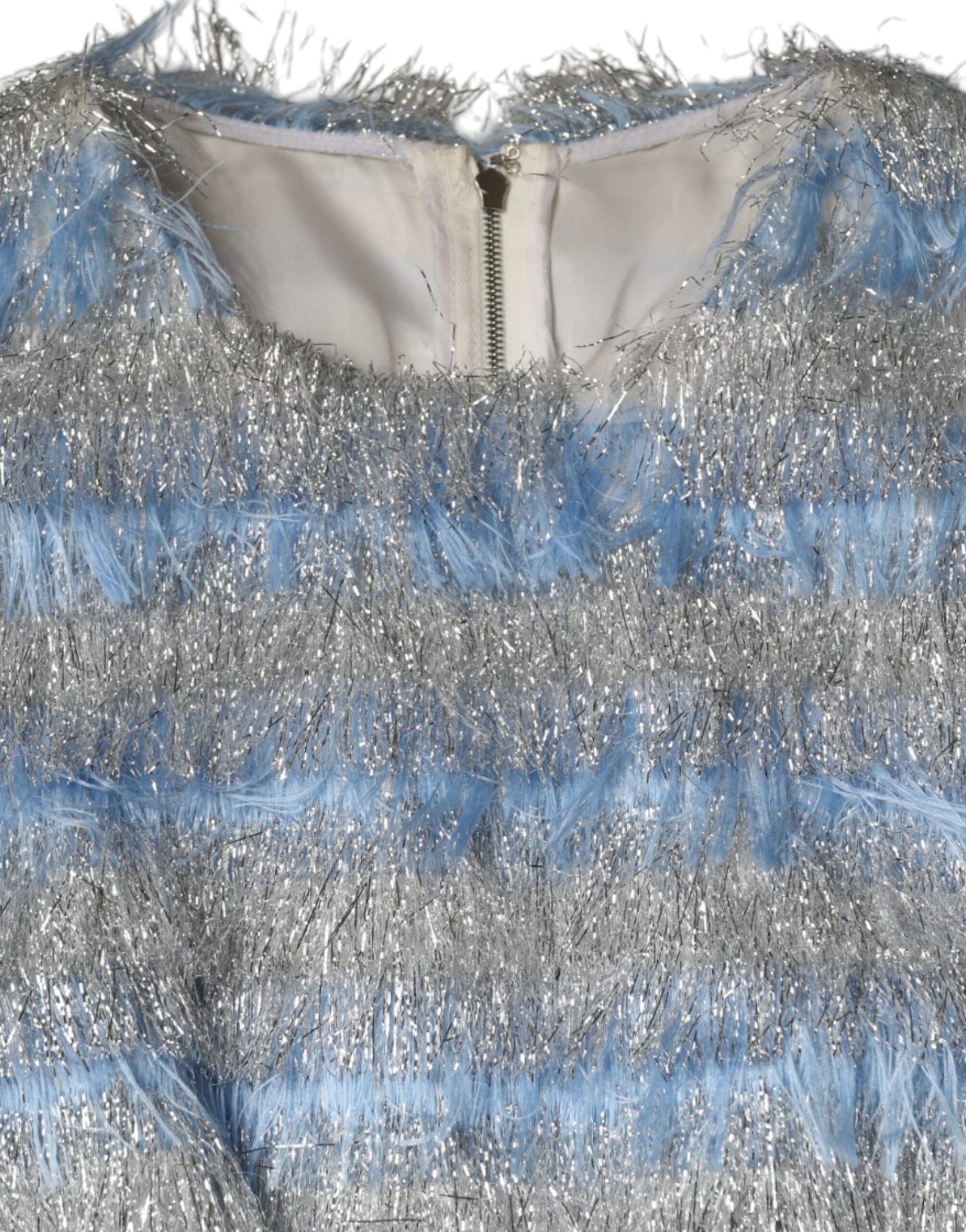 A dress with a light blue and silver jacquard pattern featuring fringe details