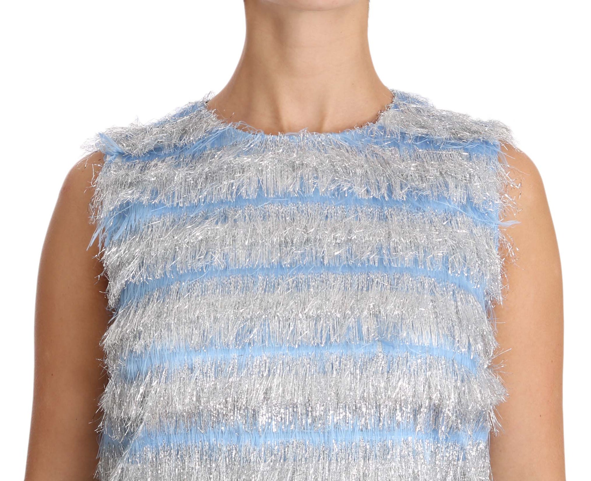 A blue and silver sequined dress with a fringe detail on the sleeves