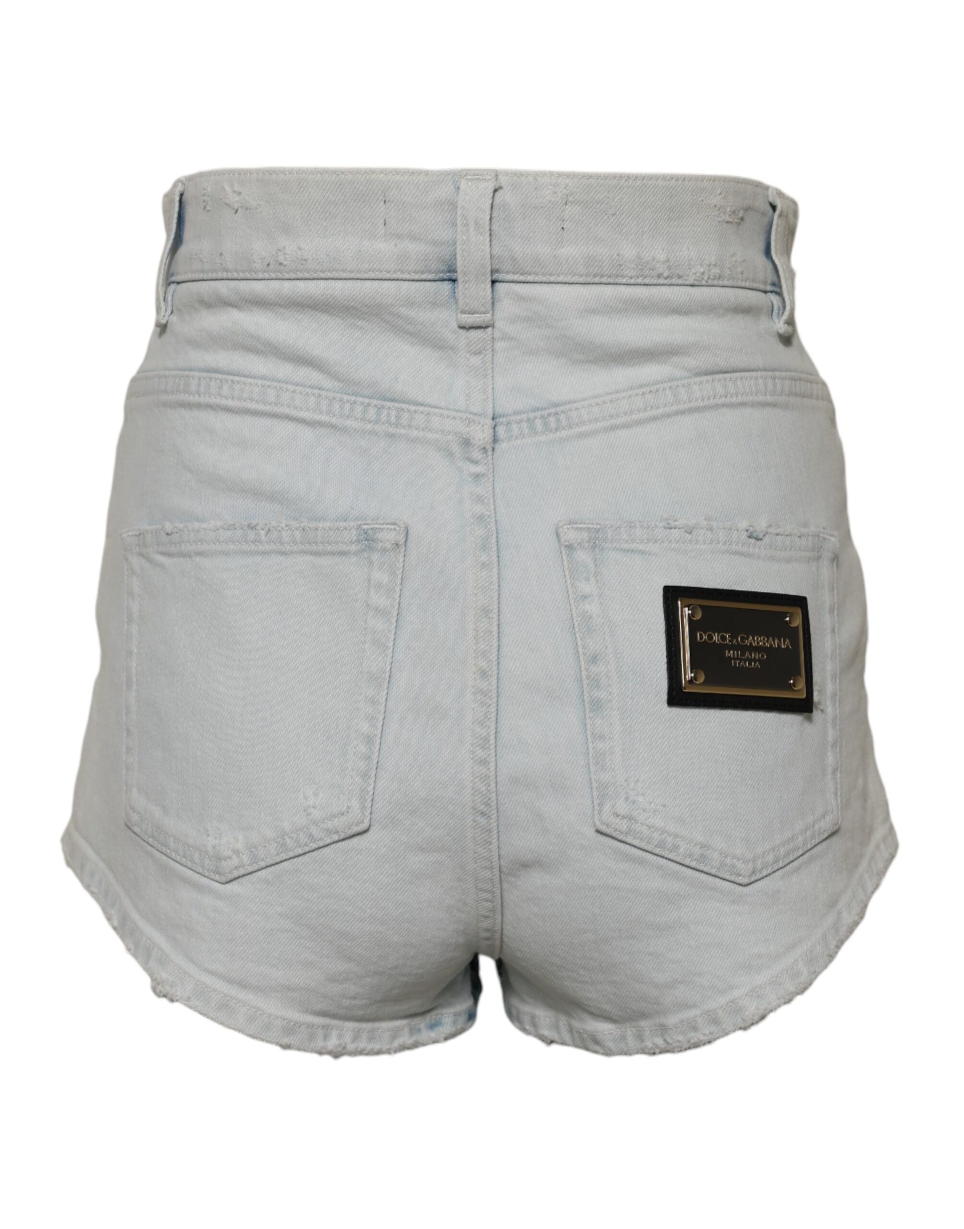 Pair of light blue denim shorts with front pockets and a small label on the right side