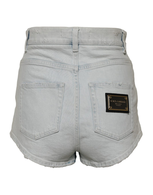 Pair of light blue denim shorts with front pockets and a small label on the right side