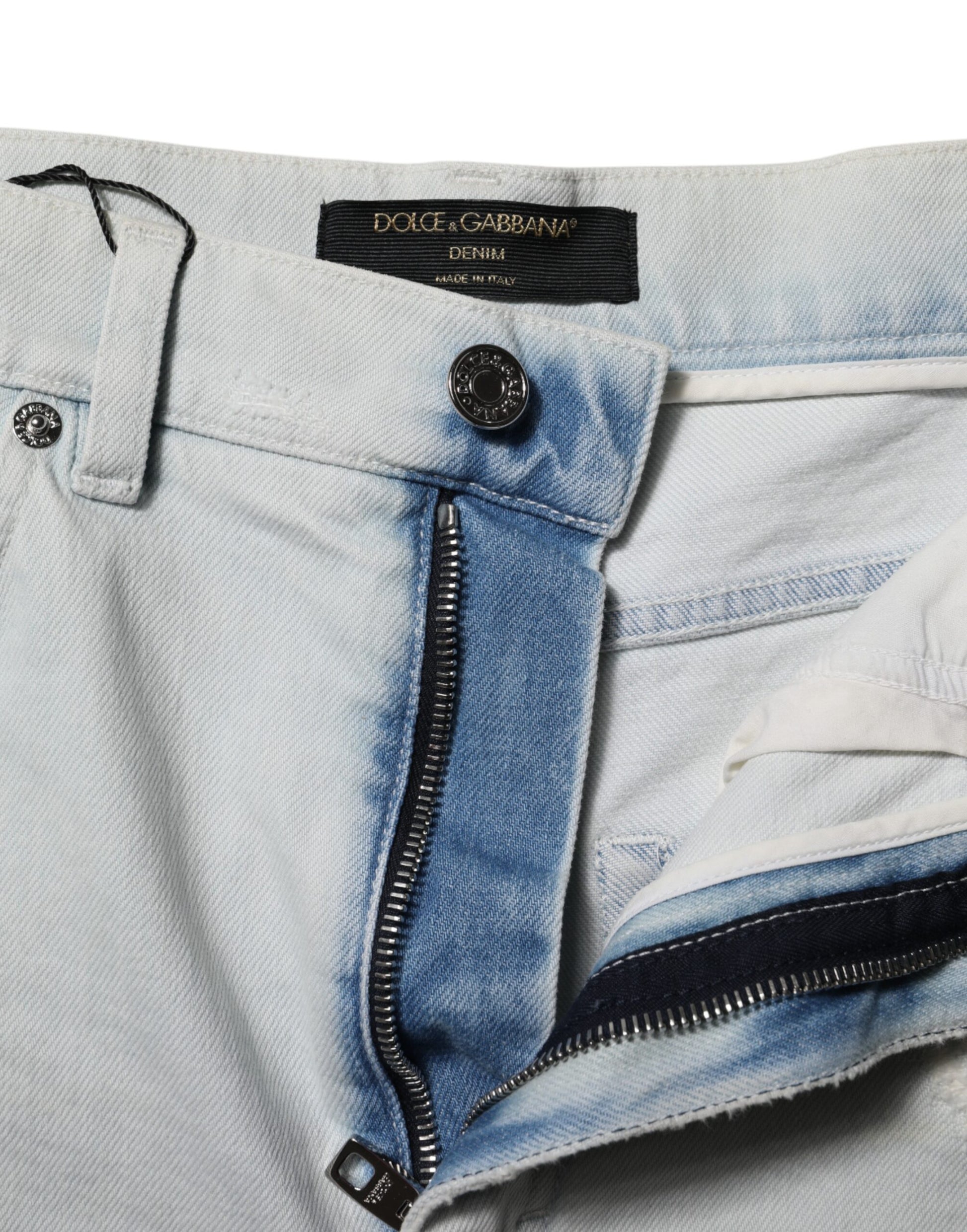 Light blue denim jeans with zippered side pockets