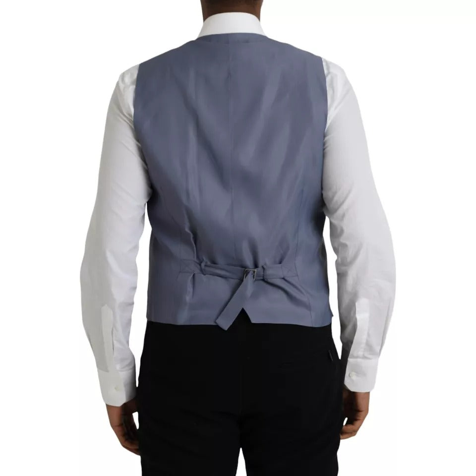 A light blue wool vest with a bow tie, part of a formal dress ensemble