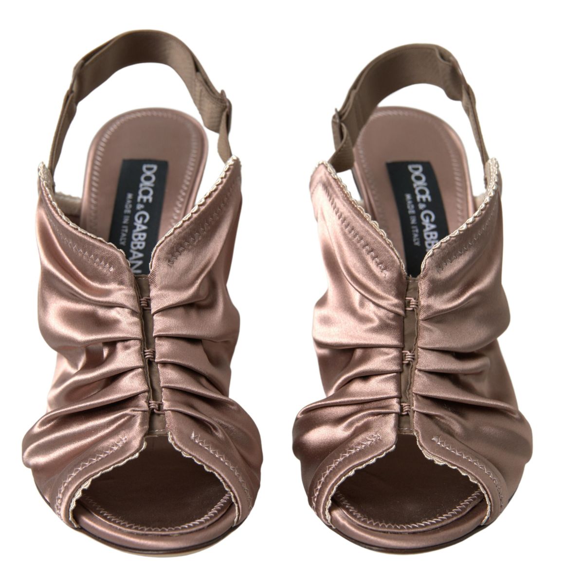 Pair of women's strappy sandals with a bow design on the vamp and ankle strap