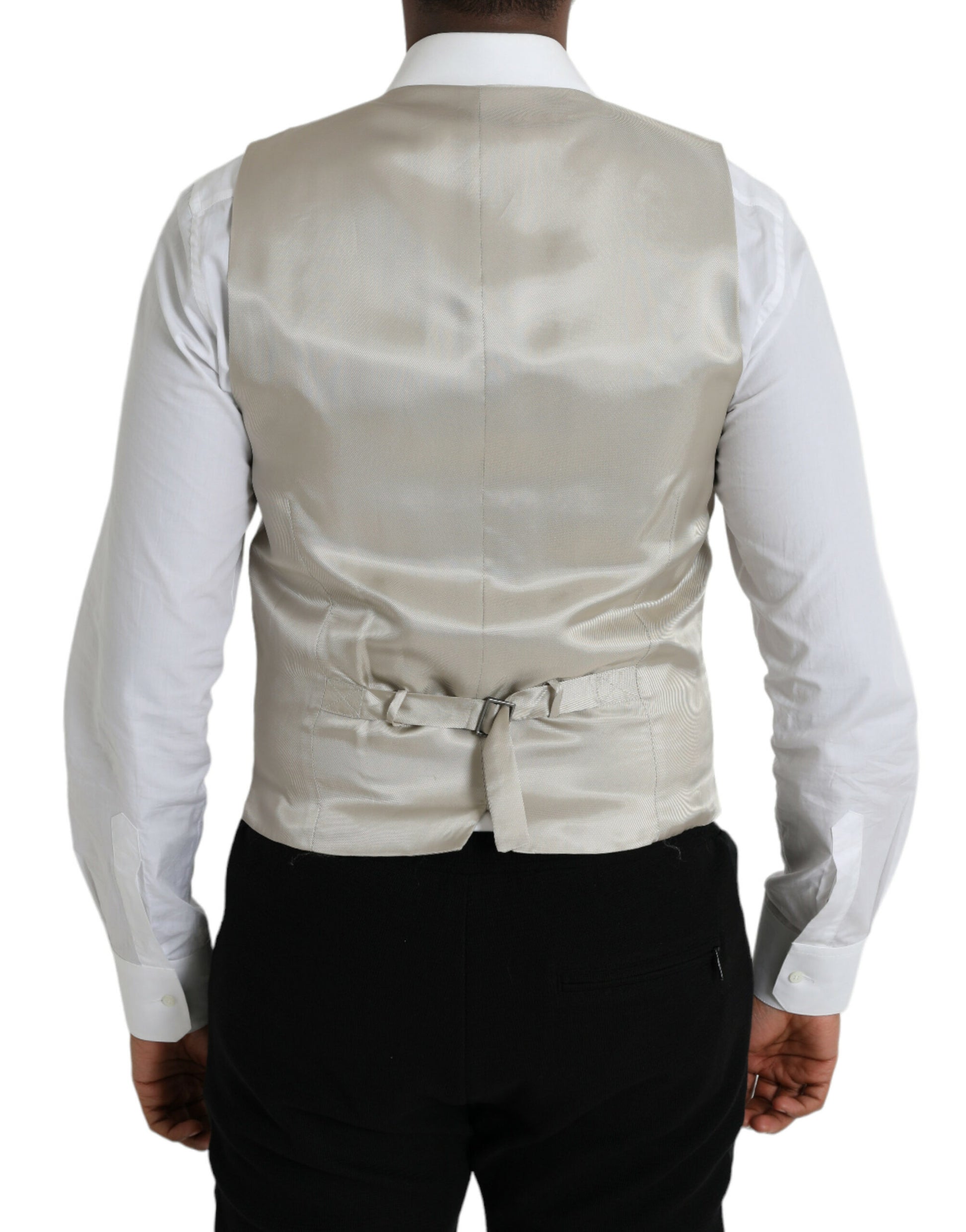 A light gray wool vest with a bow tie, part of a formal dress ensemble